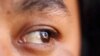 FILE - Researchers have found that tracking eye movement can reveal when a person recognizes another.