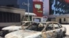 A middle-class shopping area was looted in Lekki, Oct. 22, 2020, after the army repressed peaceful protesters gathered despite curfew the day before at the Lekki toll gate. (AFP)