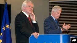 Britanski i evropski šefovi pregovaračkih timova, Dejvid Dejvis (levo) i Mišel Barnije