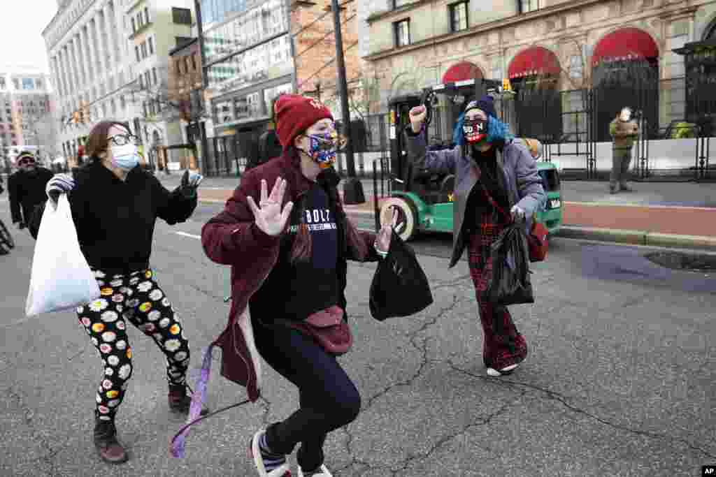 President Joe Biden's supporters dance in the streets during 59th Presidential Inauguration, in Washington, D.C.