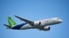 ແຟ້ມຮູບ-ເຮືອບິນໂດຍສານ Comac C919 ຂອງຈີນ ກໍາລັງບິນສະແດງໃນມື້ທໍາອິດຂອງງານສະແດງສິງກະໂປ ໃນປະເທດສິງກະໂປ, ວັນອັງຄານ, ທີ 20 ກຸມພາ 2024.