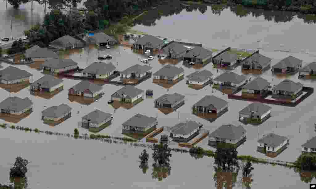 Flooded homes are seen off of LA-1064 in Hammond, Louisana, after heavy rains inundated the region, Aug. 13, 2016.
