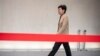 FILE - Hong Kong Chief Executive Carrie Lam arrives for a press conference in Hong Kong, Nov. 19, 2019.