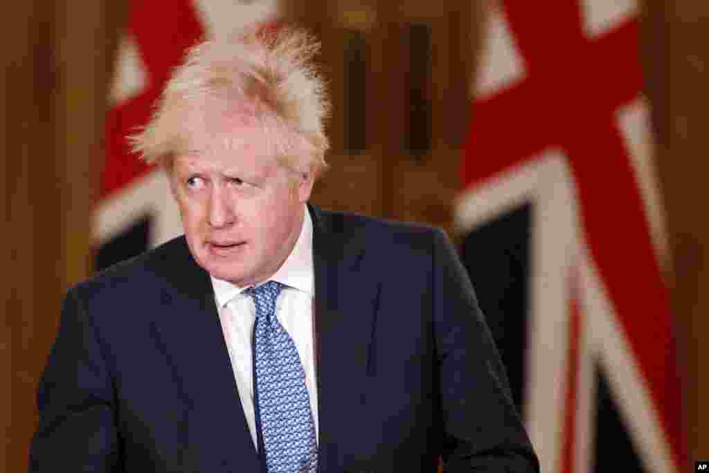 Britain's Prime Minister Boris Johnson speaks during a media briefing in Downing Street, London.