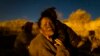 EDITORS NOTE: Graphic content / TOPSHOT - Sulan, a migrant woman from Venezuela, is comforted by her daughter as she cries while retelling her journey to reach El Paso, Texas on April 2, 2024.