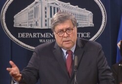 FILE - U.S. Attorney General William Barr speaks to reporters about the ongoing protests in the wake of the death in Minneapolis police custody of George Floyd, July 28, 2020.