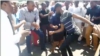 Zimbabwe nurses and doctors on Sept. 16, 2019 in Harare, near President Emmerson Mnangagwa’s offices chanting songs. (C. Mavhunga/VOA)