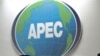Japanese security officers stand guard at the APEC venue in Yokohama, near Tokyo, 10 Nov 2010