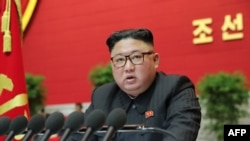 This picture released by North Korea's official Korean Central News Agency (KCNA) Jan. 9, 2021, shows North Korean leader Kim Jong Un speaking at the 8th Congress of the Workers' Party of Korea, in Pyongyang.