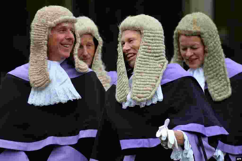Judges leave after attending a service to mark the beginning of the legal year in England and Wales, at Westminster Abbey, in central London.
