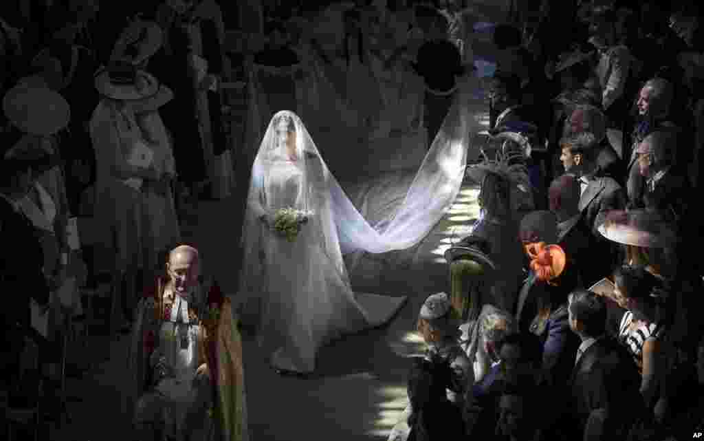 Meghan Markle walks down the aisle as she arrives for the wedding ceremony at St. George's Chapel in Windsor Castle in Windsor, near London, May 19, 2018.