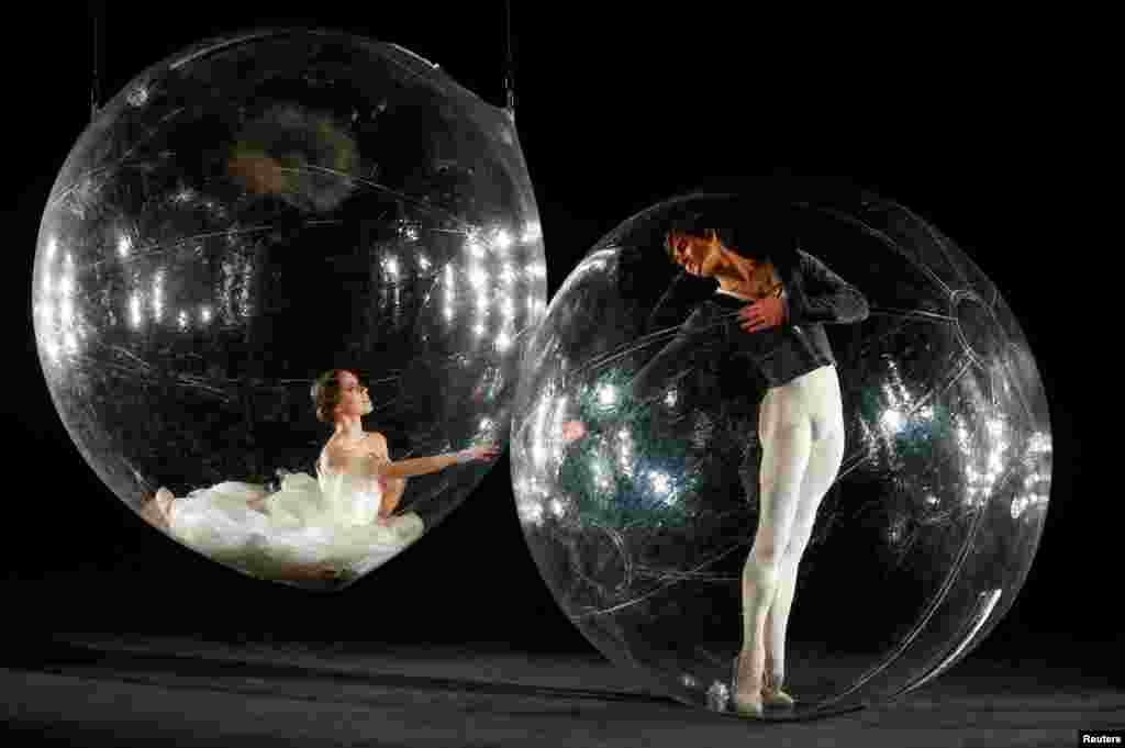 Stuttgart Ballet company dancers Elisa Badenes and Friedemann Vogel take part in performance "Social Distance Stacks" of conceptual artist Florian Mehnert at the John Cranko School in Stuttgart, Germany.