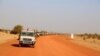 FILE - A convoy of vehicles of the Coalition of the People of Azawad (CPA) are seen patrolling an area near the Mali-Mauritania border to protect local populations from insecurity related to unrest caused by bandits, in Soumpi, Jan. 22, 2020.