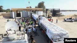 Гуманитарная помощь для населения сектора Газа на КПП «Рафах», на границе между сектором Газа и Египтом. 21 октября 2023г.