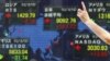 IMF Lowers Global Growth Outlook