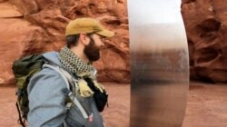 David Surber is seen after discovering the location of a metal monolith in Red Rock Desert, Utah, Nov. 27, 2020.