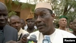 FILE - A still image taken from video shows Mali's then-Defense Minister Abdoulaye Idrissa Maiga speaking to reporters at Gao hospital, in Mali, Jan. 18, 2017. Maiga was named the country's new prime minister April 8, 2017.