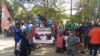 On Jan. 8, 2021, protesters hold up placards in front of the Abuja Magistrate court demanding the release of Omoyele Sowore and others arrested on New Year's Eve. (Timothy Obiezu/VOA)