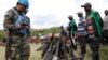 United Nations peace keepers record details of weapons recovered from Democratic Forces for the Liberation of Rwanda (FDLR) militants after their surrender in Kateku, a small town in eastern region of the Democratic Republic of Congo (DRC), last year. 