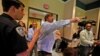 A man yells before being escorted out of a town hall meeting with Republican U.S. Senator Bill Cassidy by law enforcement, in Metairie, Louisiana, Feb. 22, 2017.