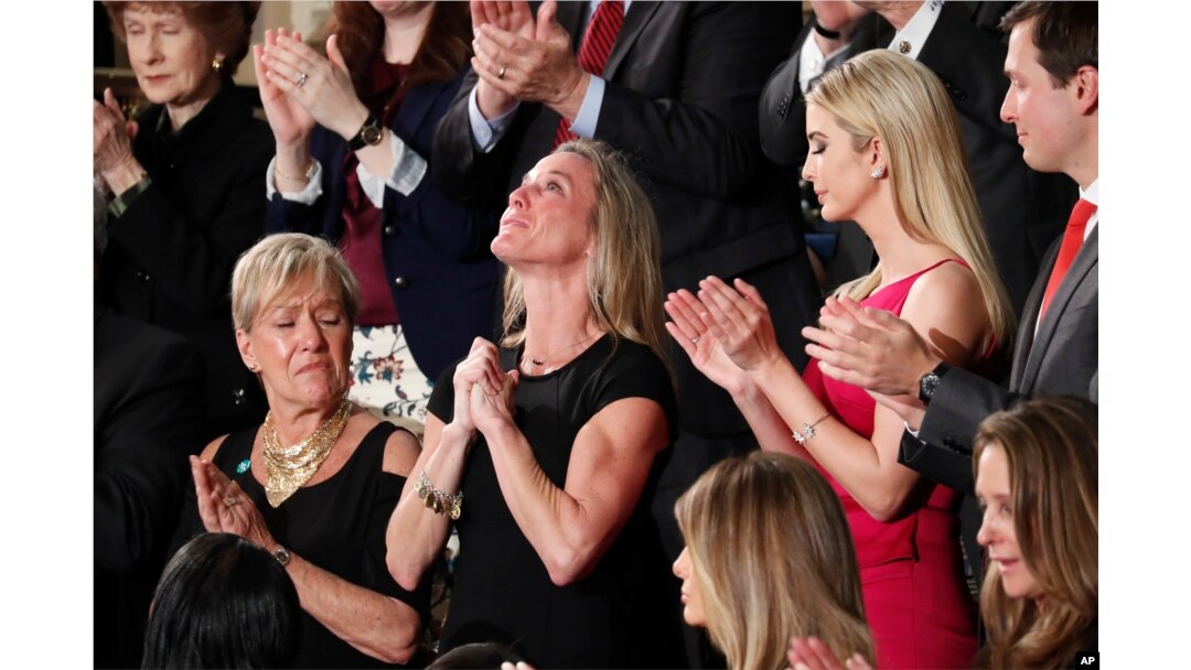 Carryn Owens, widow of Navy Seal William “Ryan” Owens, is applauded during President Trum's speech on February 28.