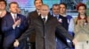 Russian President Vladimir Putin addresses the crowd during a concert marking the fifth anniversary of Russia's annexation of Crimea, in Simferopol, March 18, 2019.