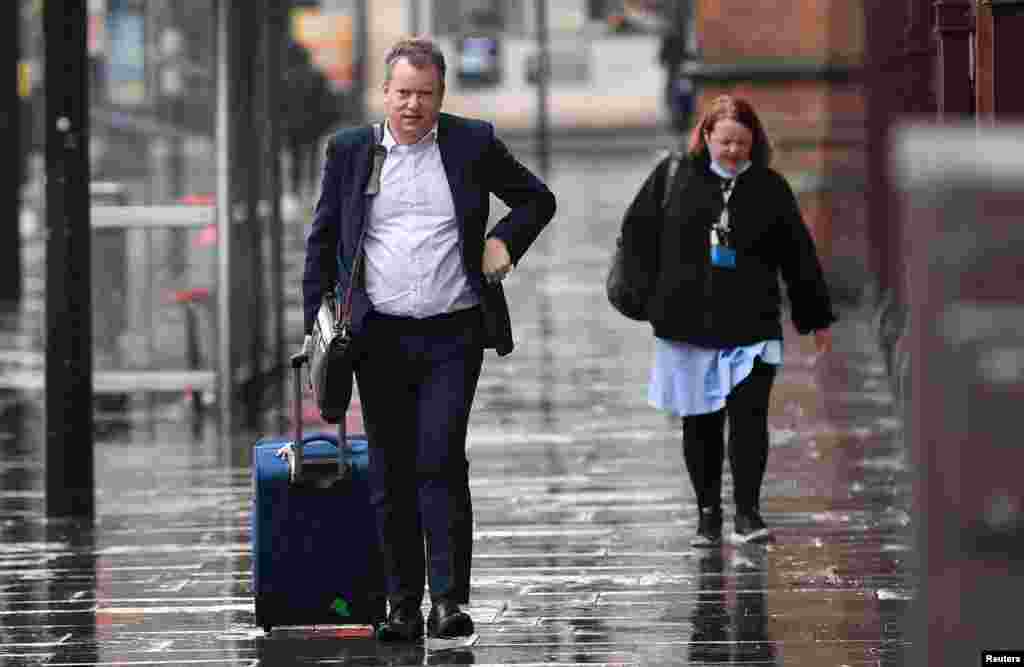 Britain's chief Brexit negotiator David Frost arrives at St. Pancras International station in London.