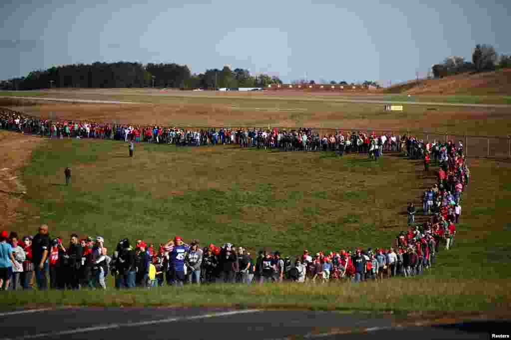 Supporters wait for U.S. President Donald Trump's campaign rally at Hickory Regional Airport in Hickory, North Carolina, Nov. 1, 2020.