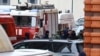 По меньшей мере один человек погиб в результате взрыва в элитном жилом доме в Москве