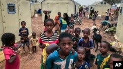 Children of around 6,000 ethnic Fulanis who have been displaced by attacks, gather in a makeshift camp for the displaced in Youba in Yatenga province in Burkina Faso, April 20, 2020.