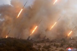 FILE - Missiles are seen in this undated picture released by North Korea's Korean Central News Agency, March 9, 2020.