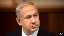 Israeli Prime Minister Benjamin Netanyahu attends the weekly cabinet meeting in his Jerusalem office, March 10, 2013.