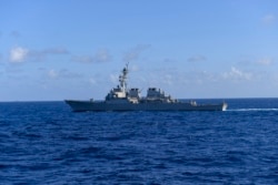 SOUTH CHINA SEA (Nov. 20, 2021) Manuari ya Arleigh Burke-class guided-missile destroyer USS Milius (DDG 69) ikiwa katika eneo la Bahari ya South China Nov. 20, 2021.