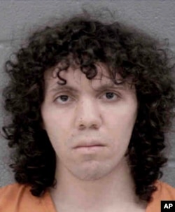 This April 30, 2019, booking photo provided by Mecklenburg County Sheriff's Office shows Trystan Andrew Terrell.Police arrested Terrell on charges of murder and attempted murder after he opened fire on students at a North Carolina university.