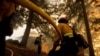 Cooler Temperatures, Rain Begin to Ease Wildfires in Western US