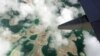 Lagoons can be seen from a plane as it flies above Kiritimati Island, part of the Pacific Island nation of Kiribati, April 5, 2016.