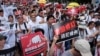 Many protesters call for Chief Executive Carrie Lam’s resignation in Hong Kong, June 9, 2019, at a demonstration against extradition to China. 
