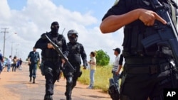 Rebeliões deixam dezenas de presos mortos