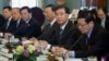 Chinese Vice Premier Wang Yang, second from right, and China's State Councilor Yang Jiechi, participate in the Joint Session on Climate Change with Secretary of State John Kerry, Treasury Secretary Jack Lew at the U.S. State Department, July 10, 2013. 