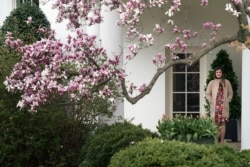 FILE - President Donald Trump's personal secretary Madeleine Westerhout stands outside the Oval Office of the White House in Washington, April 2, 2018.