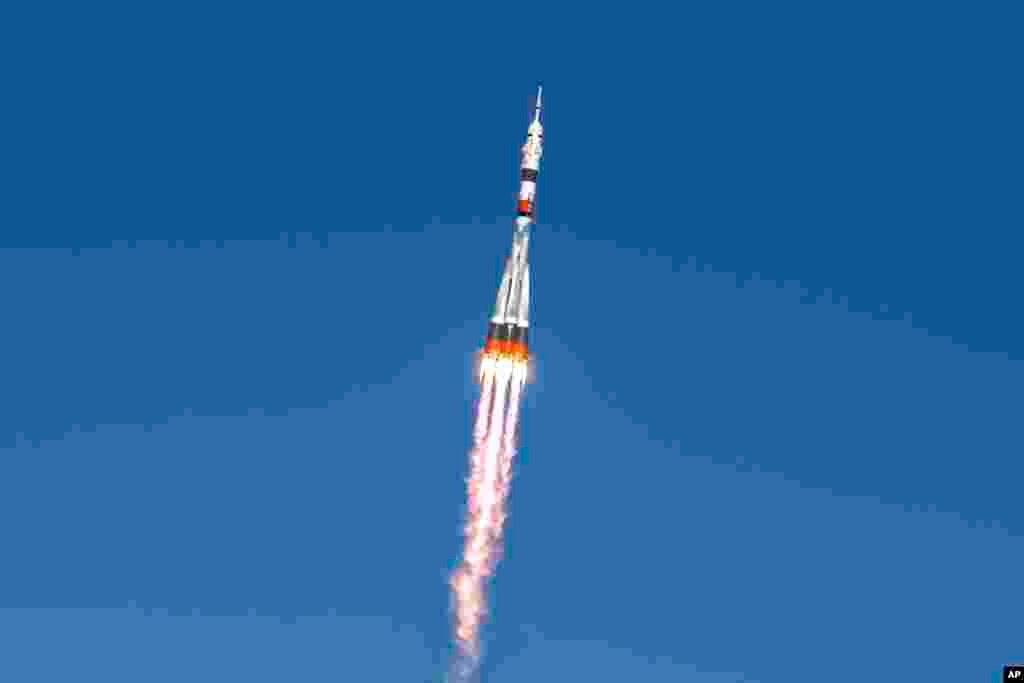 In this handout photo released by Roscosmos Space Agency, Soyuz MS-17 space ship carrying a new crew to the International Space Station (ISS) blasts off at the Russian leased Baikonur cosmodrome, Kazakhstan.