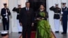 FILE- King Mswati III of Swaziland and wife Inkhosikati La Mbikiza arrive for a dinner hosted by President Barack Obama for the U.S.-Africa Leaders Summit, at the White House in Washington, Aug. 5, 2014.(file photo)