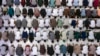 Muslim men perform an evening prayer called 'tarawih' marking the first evening of Ramadan despite concerns of the new coronavirus outbreak at the Islamic Centre Mosque in Lhokseumawe, Aceh province, Indonesia.
