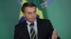 Brazil's President Jair Bolsonaro speaks during a ceremony where he signed a decree loosening restrictions on owning a firearm at Planalto presidential palace in Brasilia, Brazil, Tuesday, Jan. 15, 2019. 