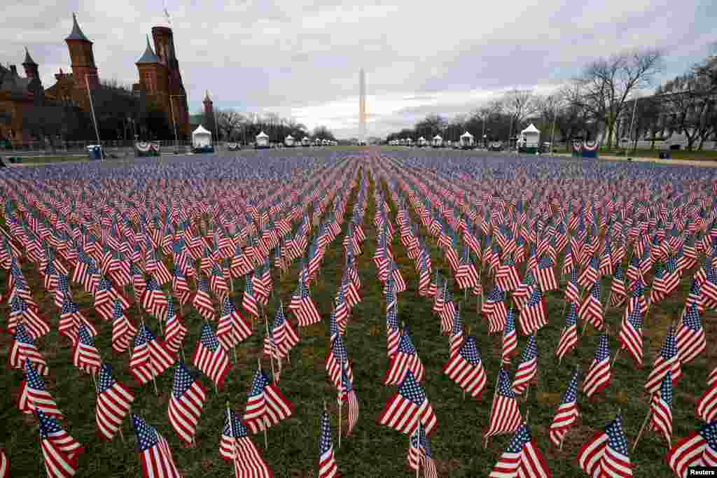 Thousands of U.S. flags are seen at the National Mall, as part of a memorial paying tribute to the U.S. citizens who have died from the COVID-19, near the Capitol ahead of President-elect Joe Biden's inauguration, in Washington, D.C.