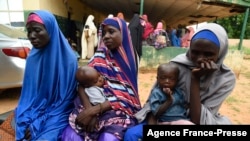 FILE - Victims narrate their ordeals with bandits at Bini primary health clinic, Sokoto, Nigeria, Sept. 22, 2021. Gangs of heavily armed criminals have terrorized northwest and central states of Nigeria for years. But violence has spiraled in recent months.