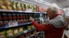 Altos precios e inflación agobian a los argentinos