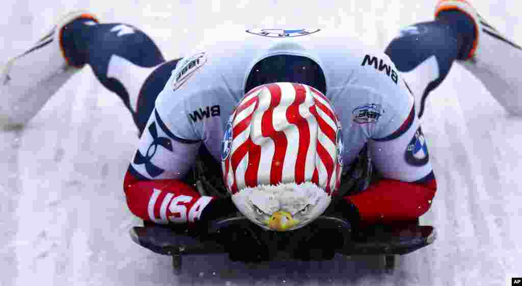 Katie Uhlaender of the United States reacts at the end of her run during the women's skeleton race at the Bobsleigh and Skeleton World Championships in Altenberg, Germany.
