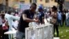 A party delegate casts his vote during the All Progressives Congress (APC) primary election to choose the party's governorship candidate for Lagos state, at Onikan stadium in Lagos, Dec. 4, 2014.