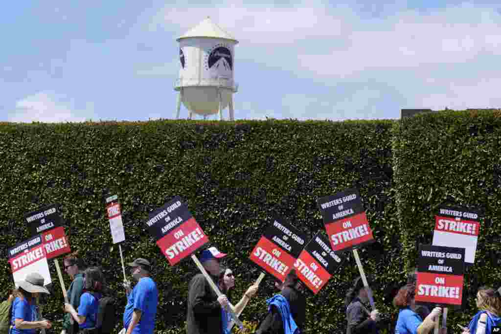 Striking writers take part in a rally in front of Paramount Pictures studio, May 2, 2023, in Los Angeles. California. 